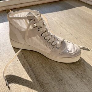 White Micheal Kors sneakers.